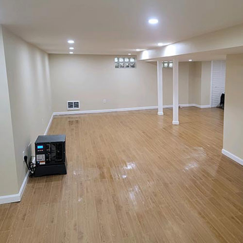 A well-finished basement by Northeast Basement Solutions