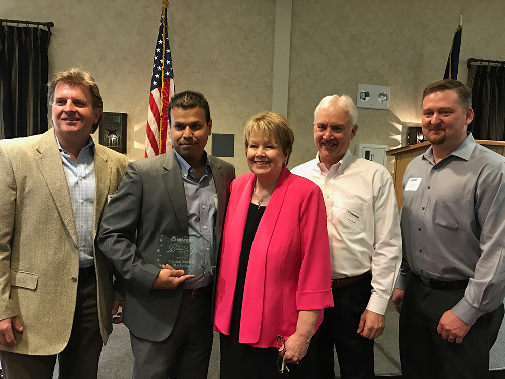 Dan, Evan, James and Chris Accepting the Award